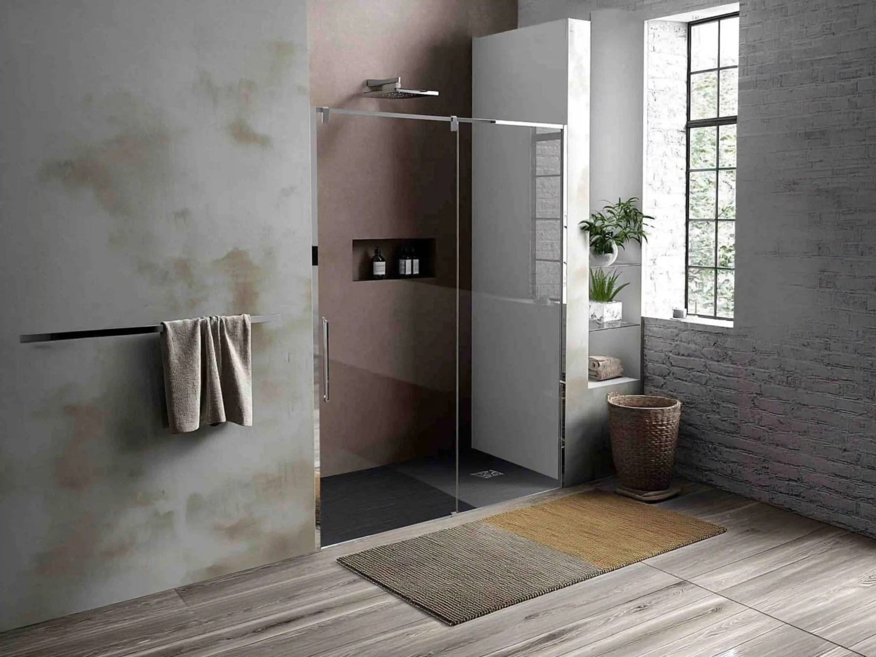 Bagno scuro moderno: come gestire il calcare su piatti e profili neri